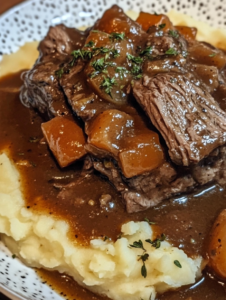 Beef and Gravy Over Mashed Potatoes