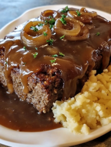 Savory Meatloaf with Caramelized Onion Gravy