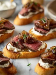 Steak Crostini with Horseradish Sauce, Caramelized Onions